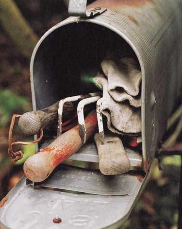 mailbox for garden tool storage